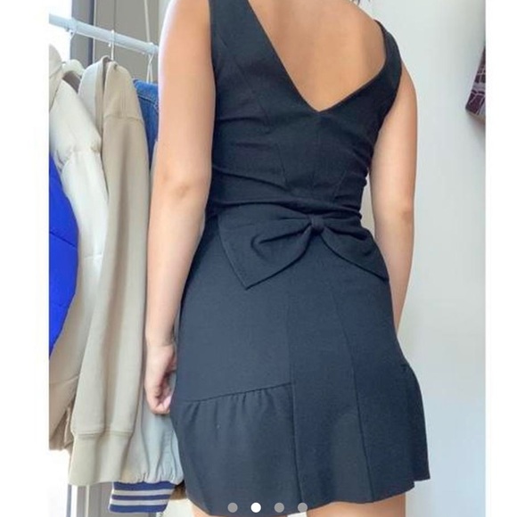 Juicy Couture black mini dress with bow in the back. - Picture 2 of 4